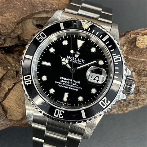 rolex submariner nero con il cinturino nero|Rolex Submariner Date ー black 16610 .